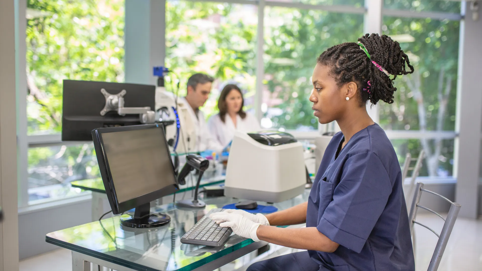 Scientist examining a sample in the lab